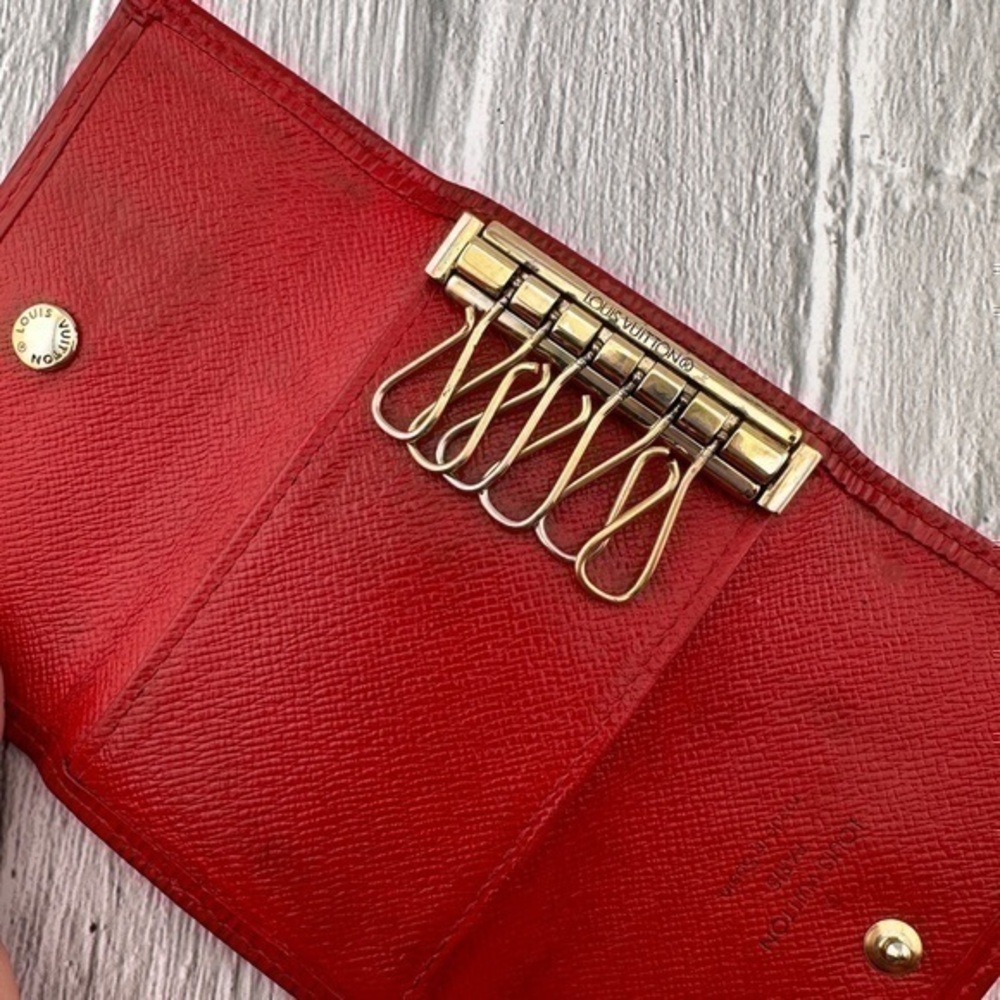 AUTHENTIC Louis Vuitton key holder. Previously owned. Color: Castilian red. - Picture 6 of 16